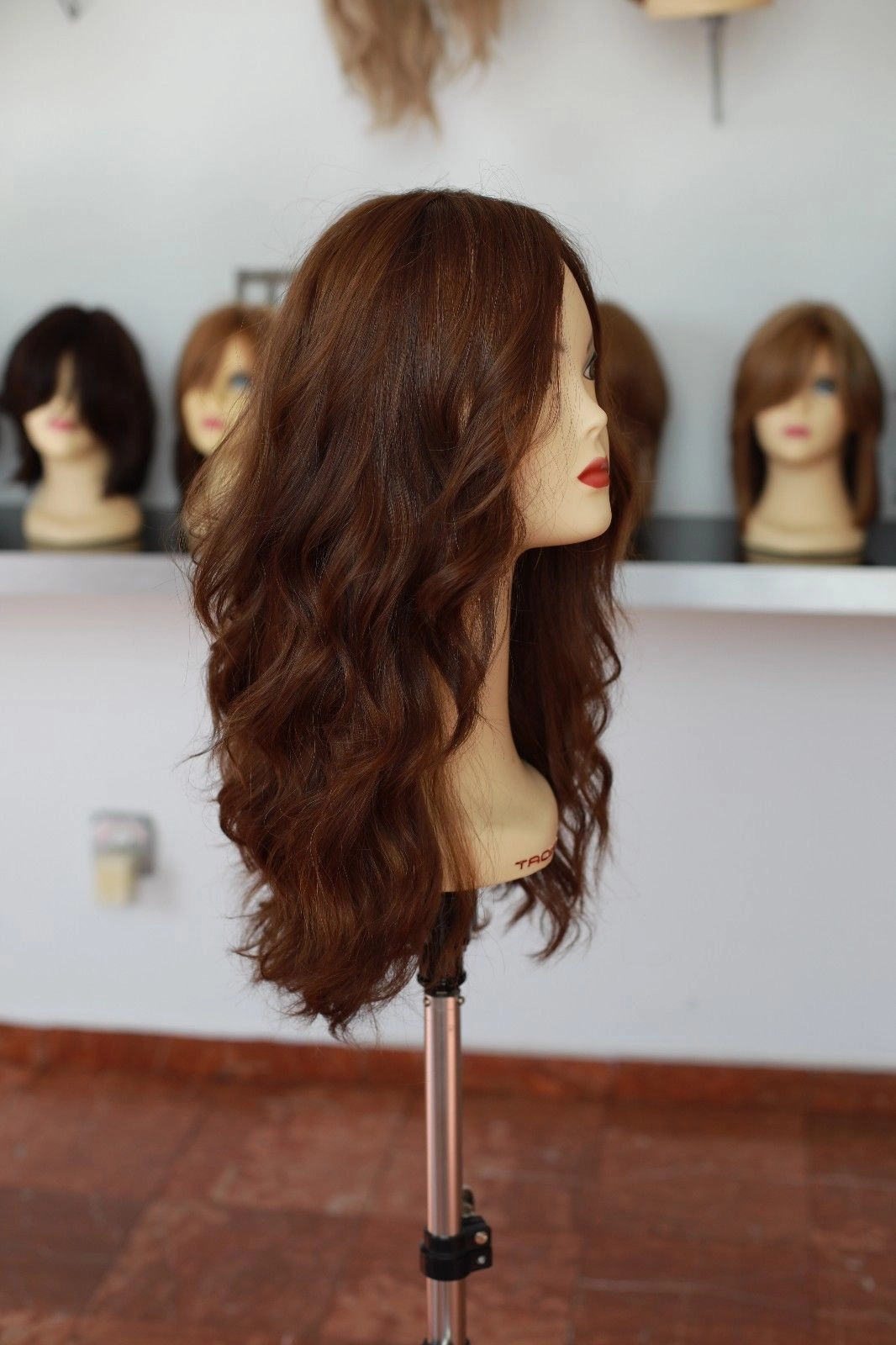 Beautiful Virgin European 22" light brown combination with soft red wig.