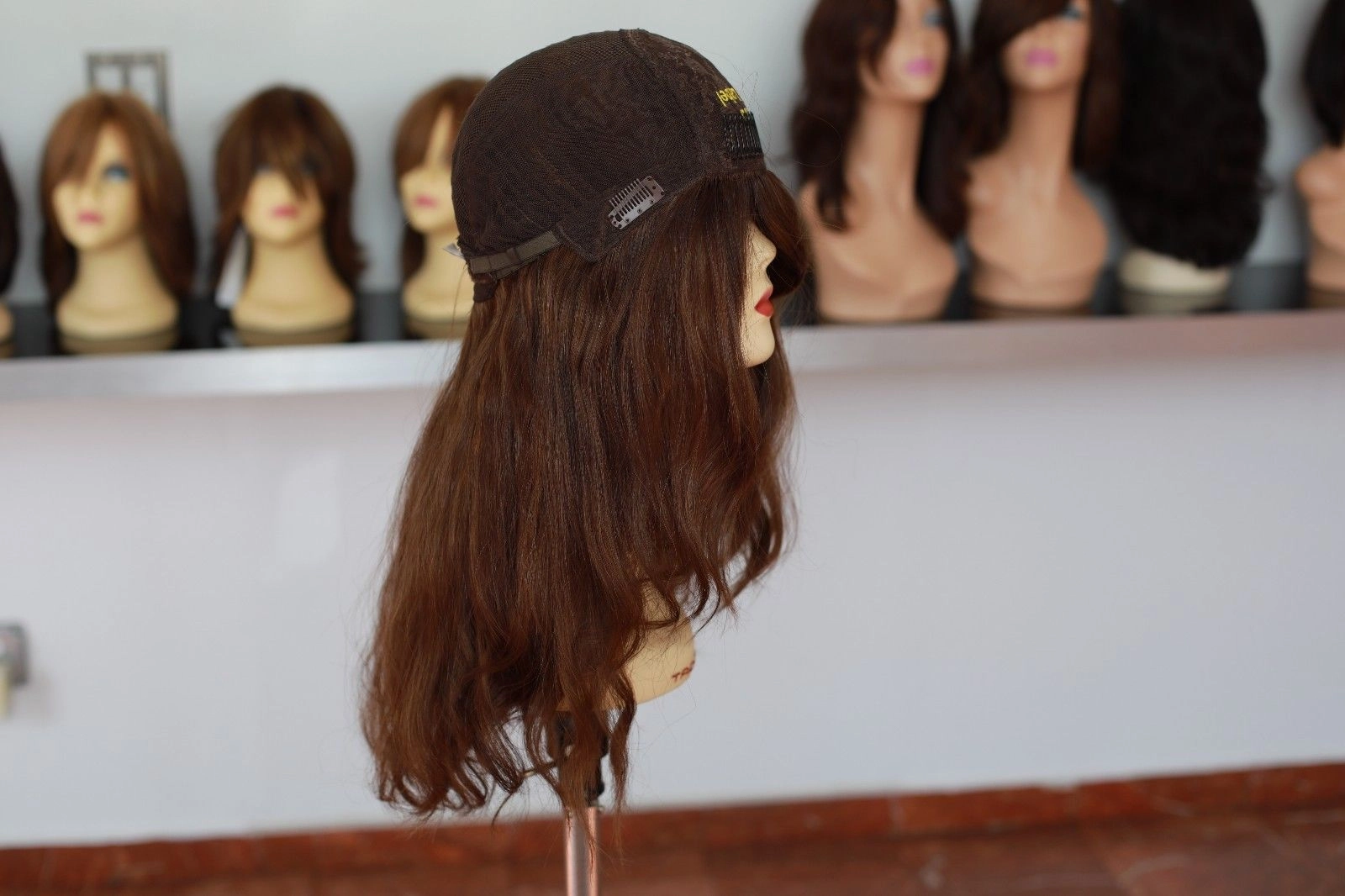 Beautiful Virgin European 22" light brown combination with soft red wig.