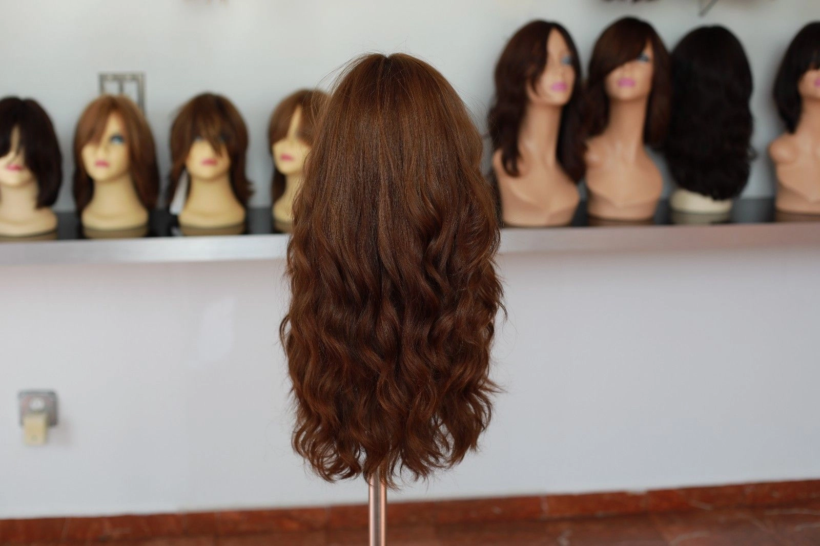 Beautiful Virgin European 22" light brown combination with soft red wig.