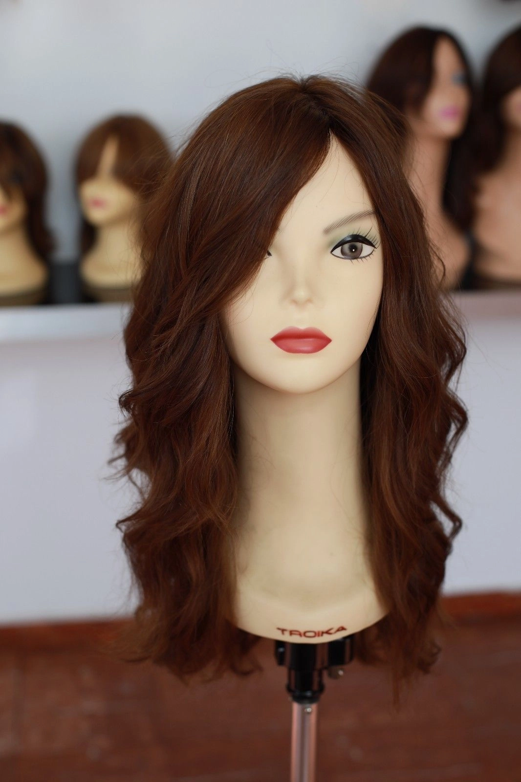 Beautiful Virgin European 22" light brown combination with soft red wig.